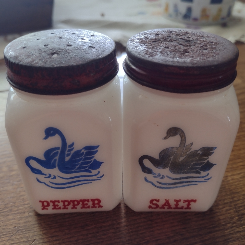 Antique milk glass salt and pepper.